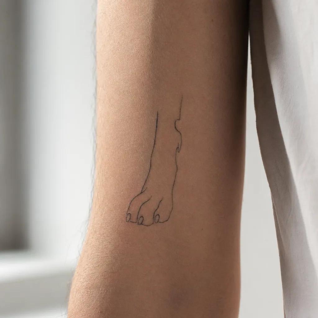 hund-tattoo minimalistische pfote