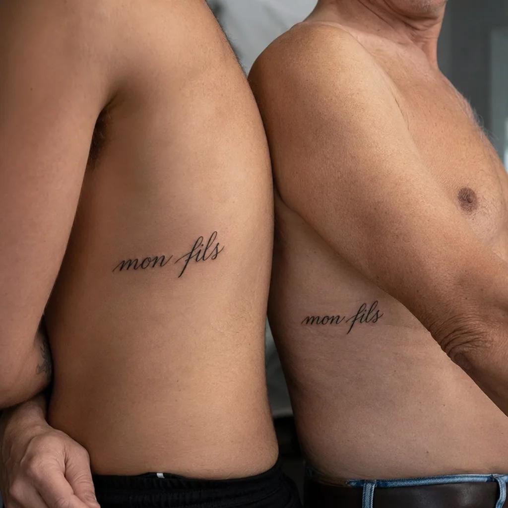 vater und sohn-tattoo dotwork-fußabdrücke